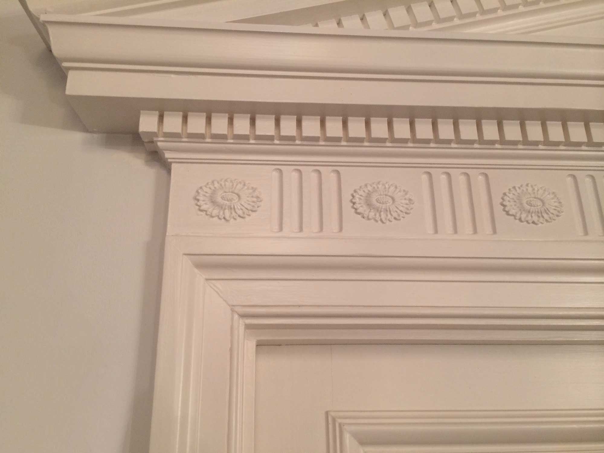 E Augustus Bespoke Furniture & Joinery door frame carving decoration